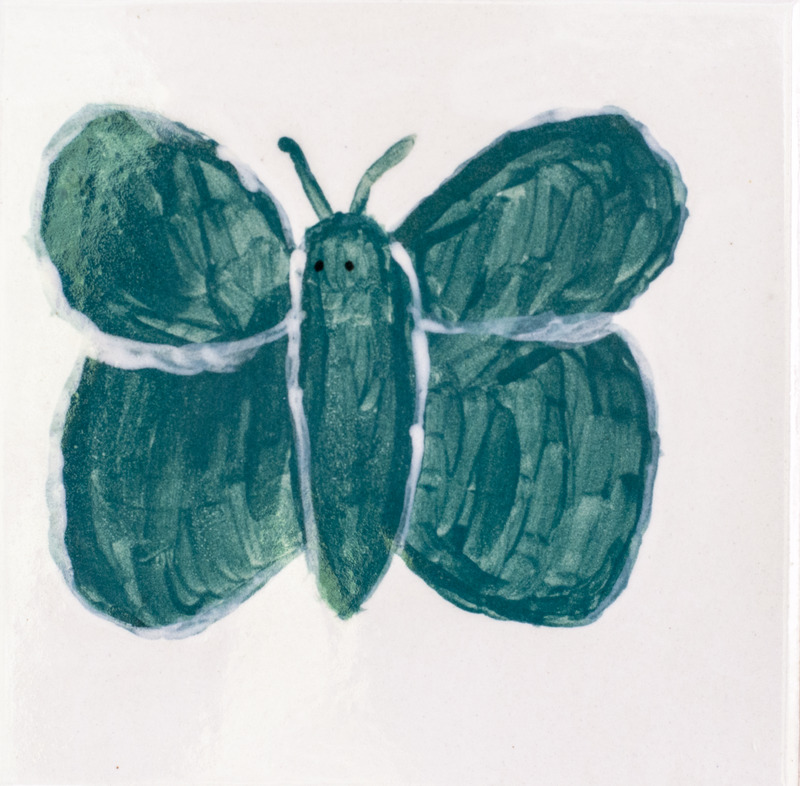 Painting of a teal and white butterfly in front of a white background.