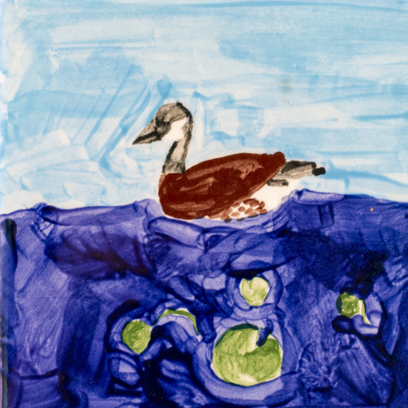 Painting of a Canada goose swimming in dark blue water with green lilypads in front of a blue sky.
