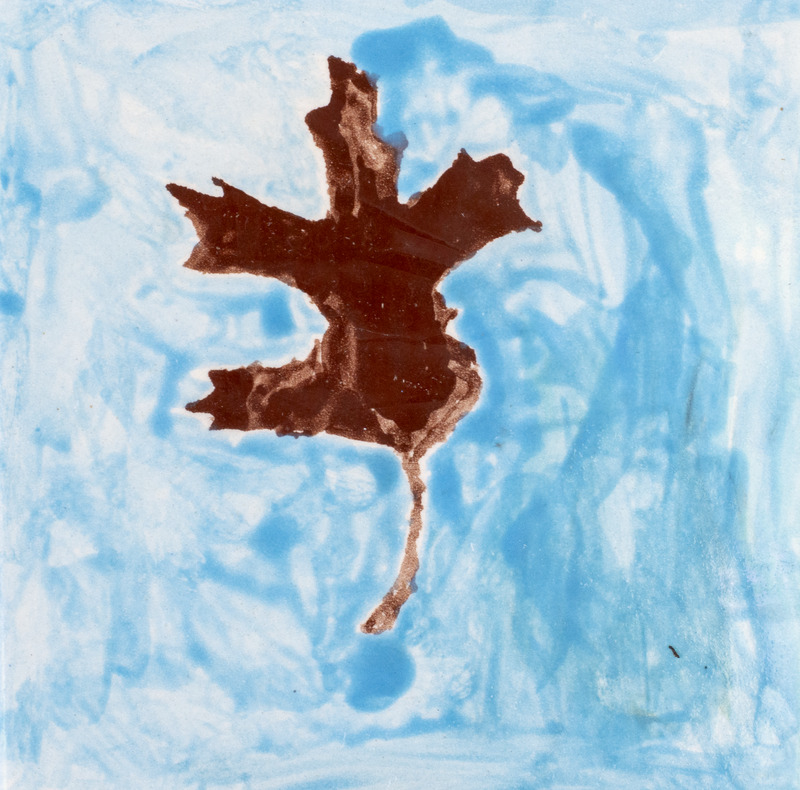 Painting of an oak leaf with a blue background.