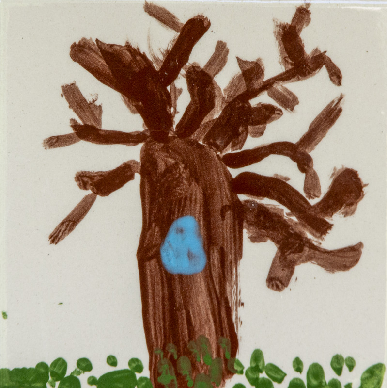 Painting of a brown tree with bare branches and green grass at the base.