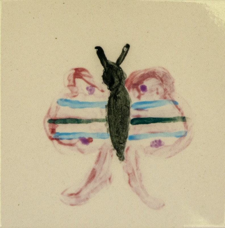 Painting of a luna moth with a dark body and antennae, pale pink wings with blue and green stripes.