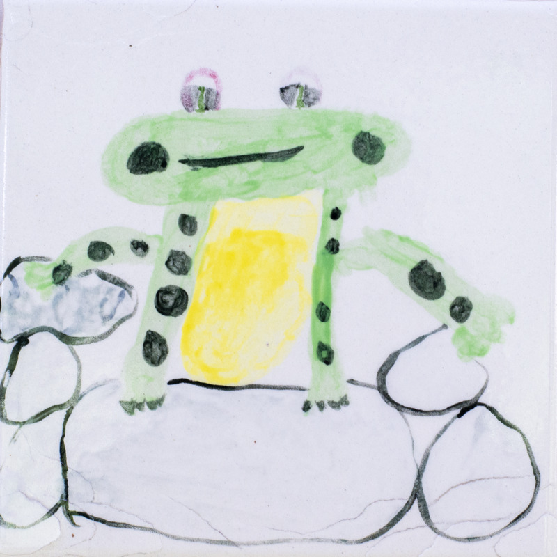 Painting of black-spotted smiling frog sitting on stones.