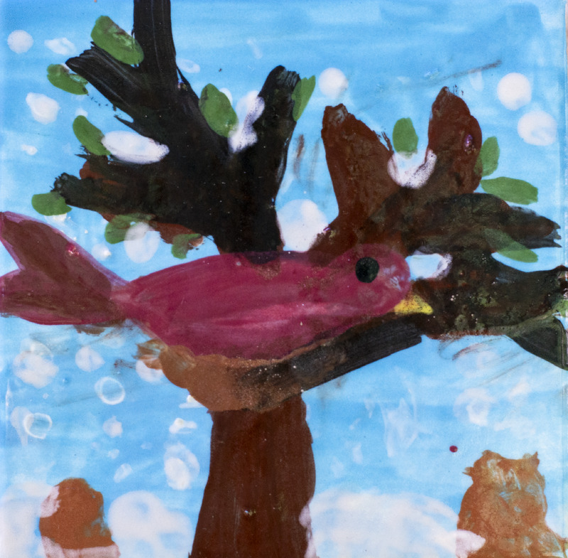 Painting of a red bird in tree with snow falling on a blue background.
