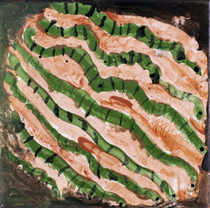 Painting of green snakes in the dirt.