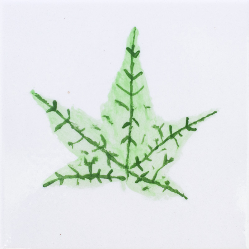 Painting of green five-pointed leaf.