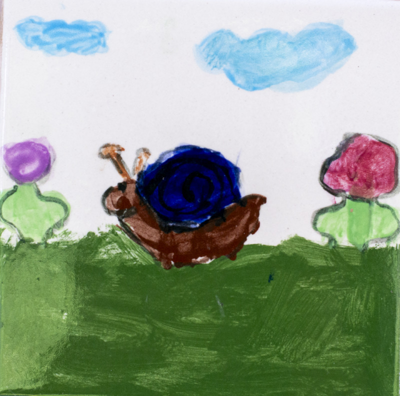 Painting of brown snail with blue shell between two pink flowers in the grass.