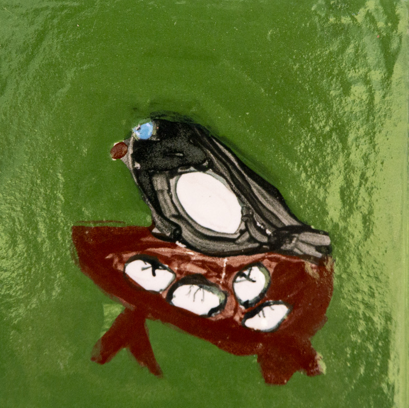 Painting of a black bird with a blue eye perched on a brown nest holding white eggs against a green background.