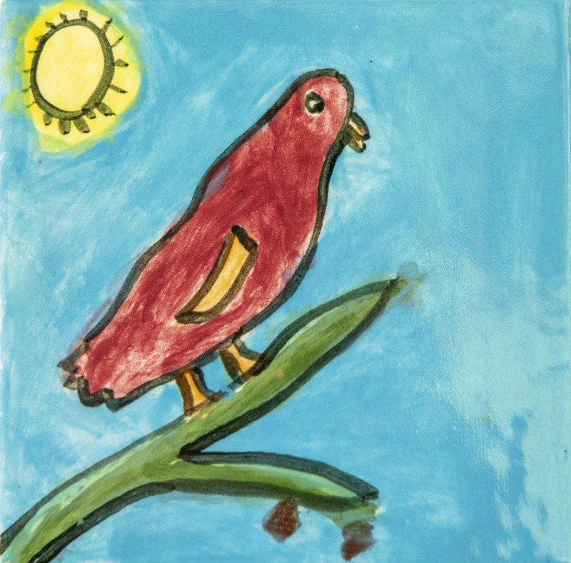 Painting of red bird perched on a green branch under a bright yellow sun in a blue sky.